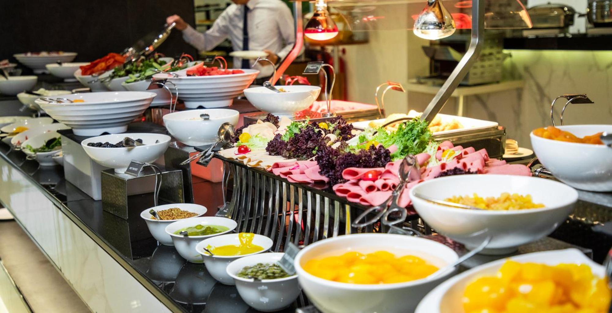 エリート ビブロス ホテル ドバイ エクステリア 写真 A buffet at a hotel